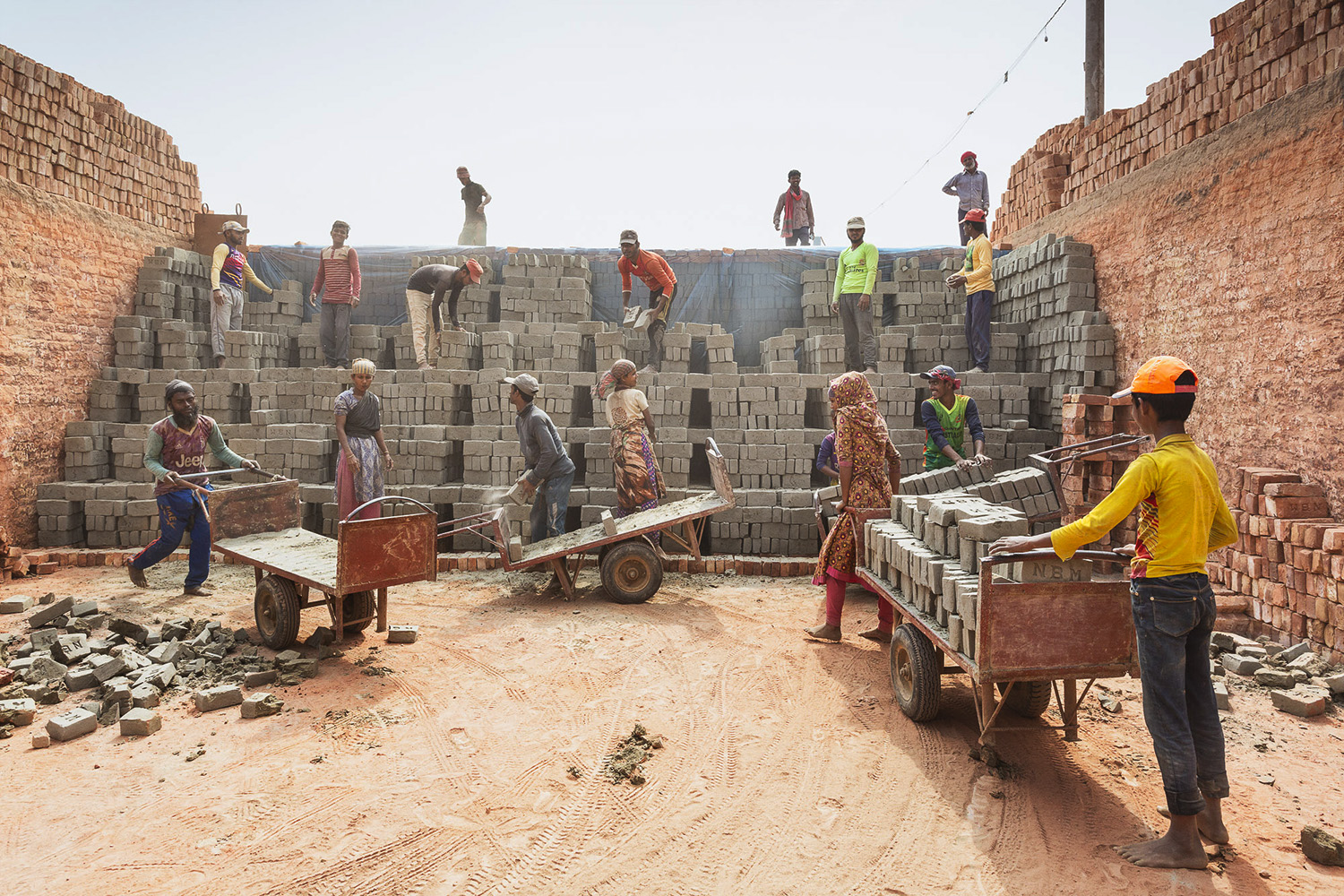 Teamwork and laughter at the Chittagong, Bangladesh brick facility.