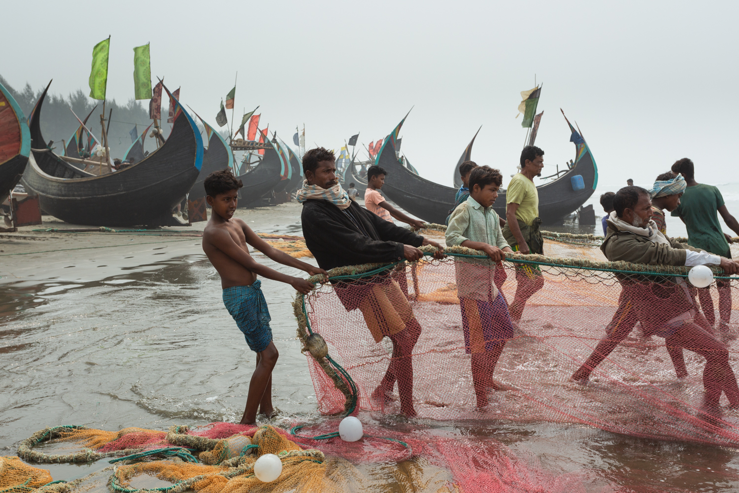 Dragging fishing nets at the Bay of Bengal, Cox’s Bazar Bangladesh