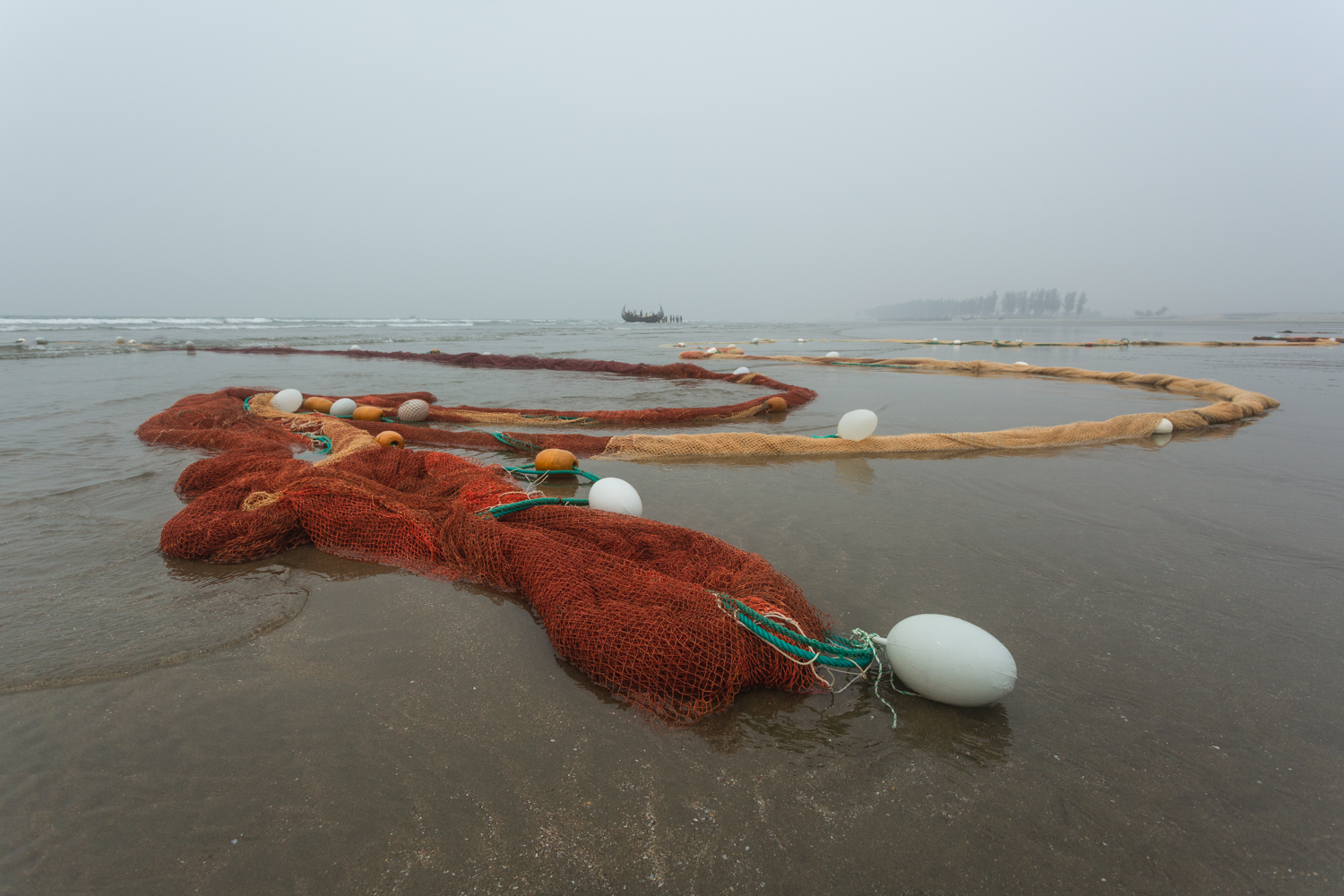 Guiding the fishing nets at the Bay of Bengal, Cox’s Bazar Bangladesh