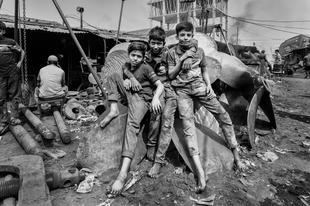 Child labourers work in hazardous conditions in a dockyard near the Buriganga River, without any safety shoes, helmets, gloves or masks.