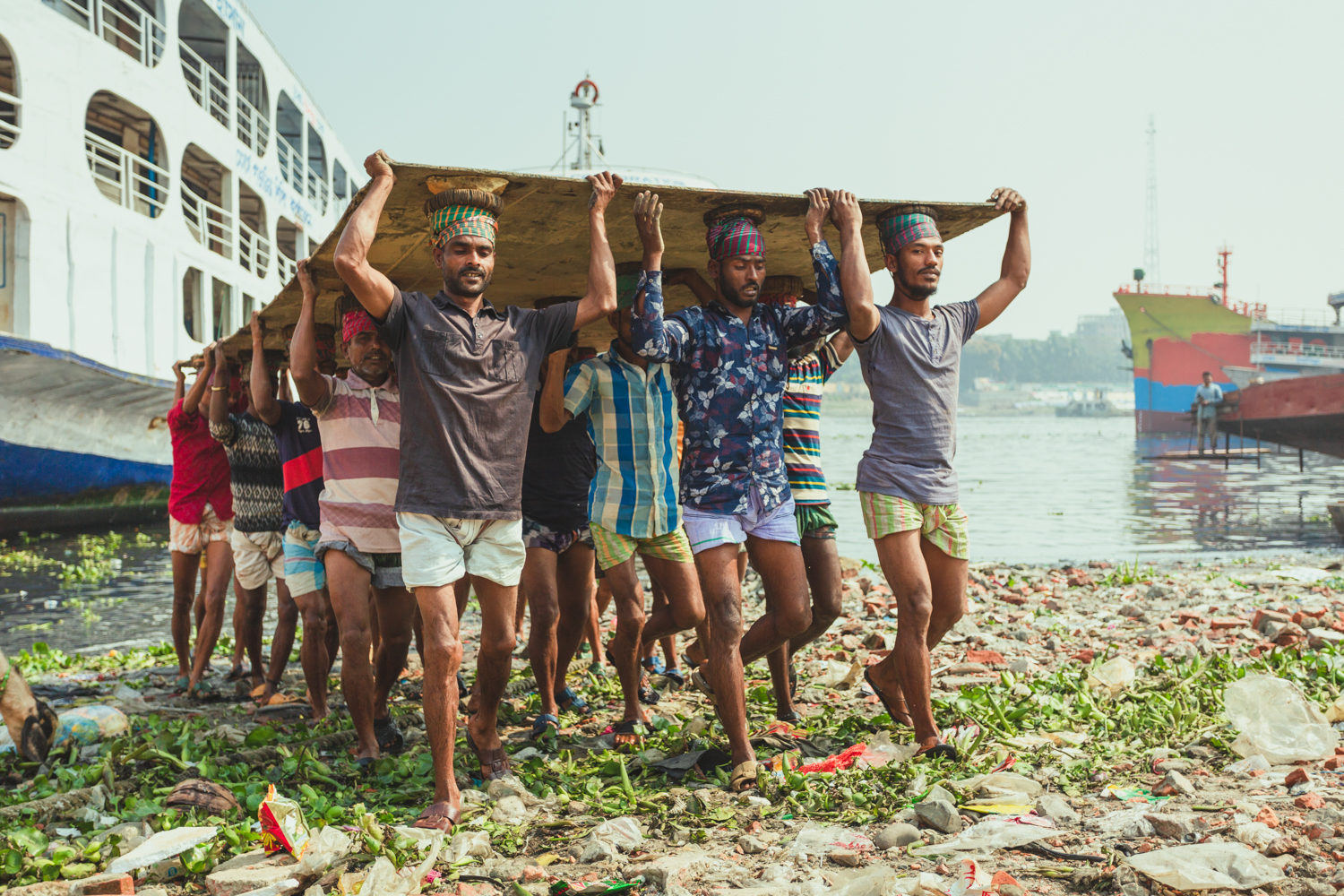 The steel-cut from the stranded ships in the shipyards is so heavy that more than a dozen workers are needed. In this way, the steel plates are taken to the furnaces, at Dhaka, Bangladesh Shipyard.