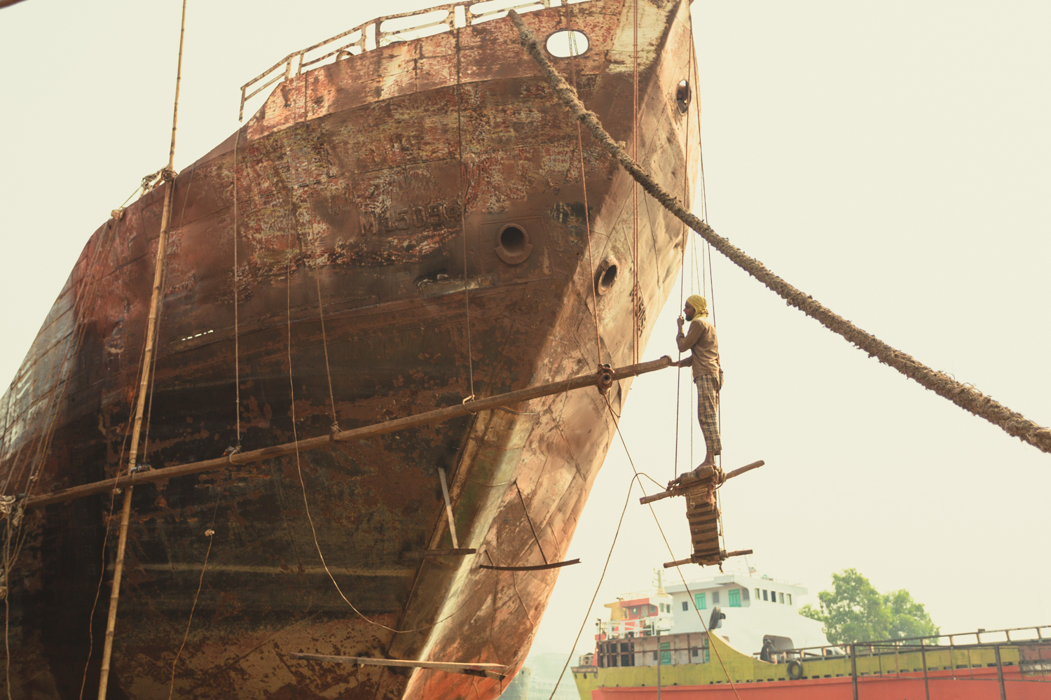 Man-made scaffolding and pulley system at Dhaka, Bangladesh Shipyard.