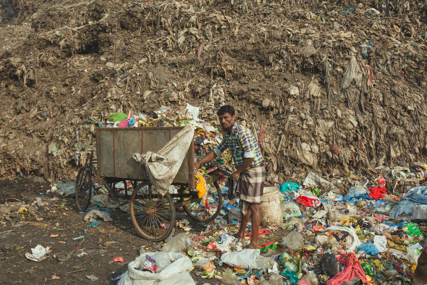 Collecting rubbish in carts in Chittagong, Bangladesh.
