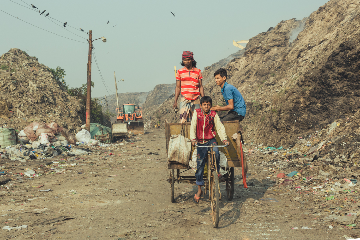 Boys running their own collection in Chittagong, Bangladesh.